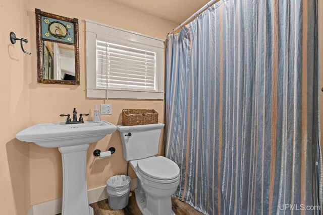 bathroom featuring toilet