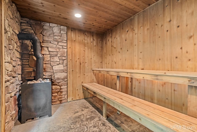 view of sauna / steam room featuring recessed lighting and unfinished concrete floors