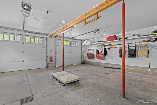 garage featuring a garage door opener