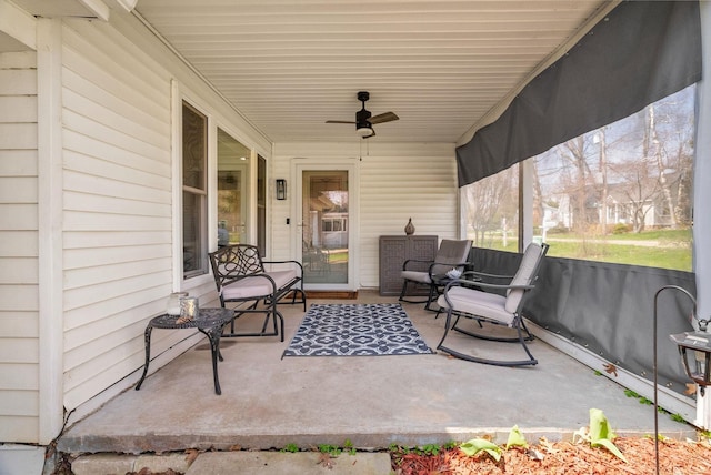 view of patio / terrace featuring ceiling fan