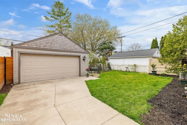 detached garage with fence