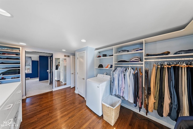 walk in closet with visible vents and wood finished floors