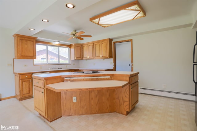 2428 Irma St, Warren, MI 48092 - kitchen featuring a kitchen island, ceiling fan, recessed lighting, light countertops, and a baseboard heating unit