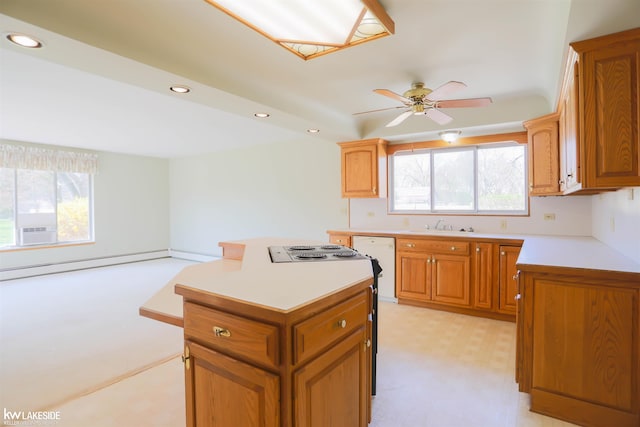 2428 Irma St, Warren, MI 48092 - kitchen featuring a center island, light countertops, a wealth of natural light, and recessed lighting