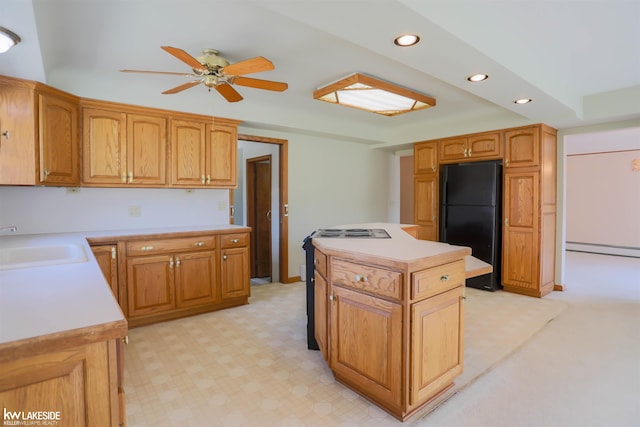 2428 Irma St, Warren, MI 48092 - kitchen featuring ceiling fan, light countertops, freestanding refrigerator, a baseboard heating unit, and recessed lighting