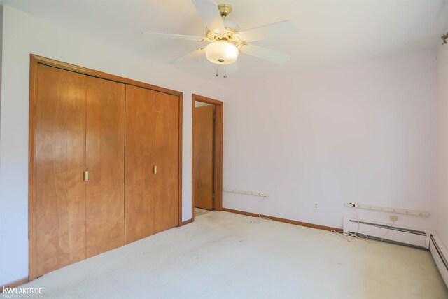 2428 Irma St, Warren, MI 48092 - unfurnished bedroom featuring a ceiling fan, carpet floors, a baseboard radiator, baseboards, and a closet