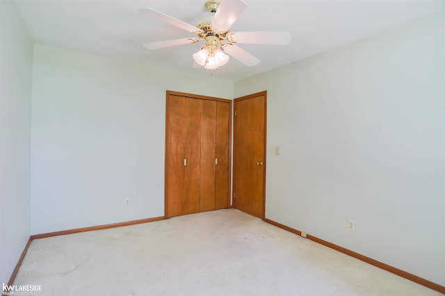 2428 Irma St, Warren, MI 48092 - unfurnished bedroom with baseboards, a ceiling fan, a closet, and light colored carpet