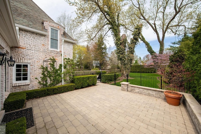 view of patio featuring fence