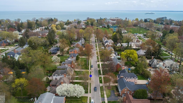 birds eye view of property featuring a residential view and a water view