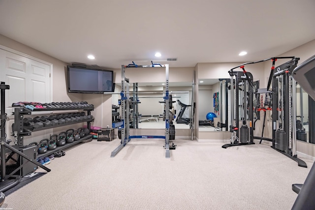 workout area with carpet floors, recessed lighting, and visible vents
