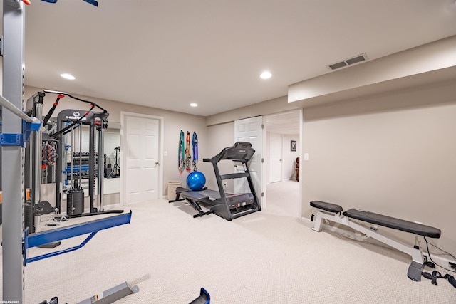 exercise area featuring visible vents, recessed lighting, baseboards, and carpet flooring