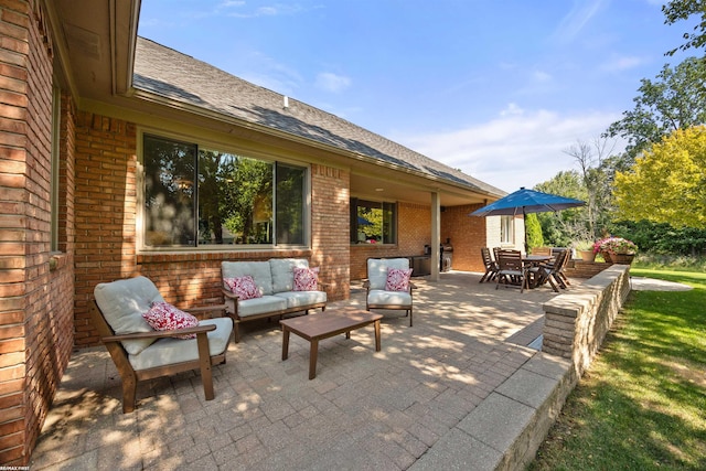 view of patio with outdoor dining area and outdoor lounge area