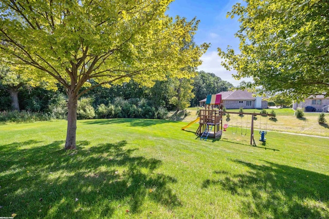 view of yard featuring playground community