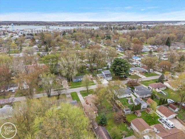 bird's eye view with a water view and a residential view