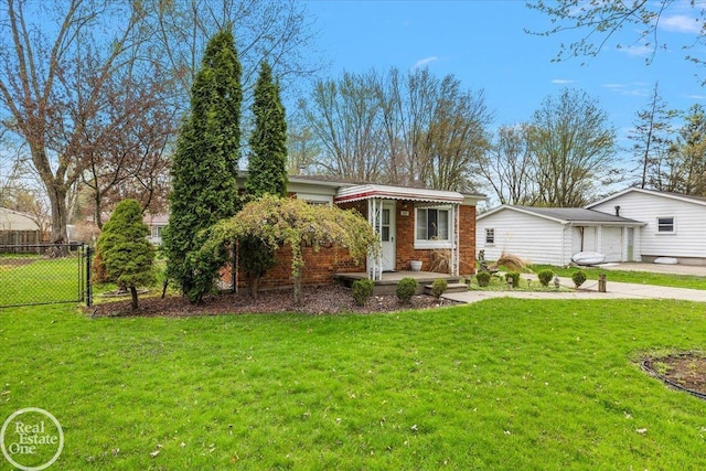 view of front facade featuring driveway, a gate, brick siding, fence, and a front lawn