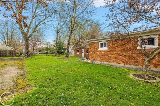 view of yard with fence