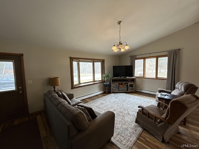 living area featuring an inviting chandelier, plenty of natural light, and a baseboard heating unit