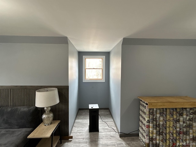 bedroom with wood finished floors