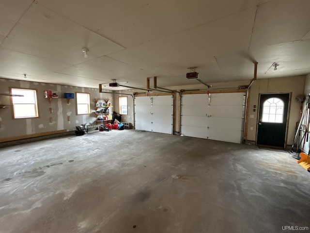 garage featuring a garage door opener