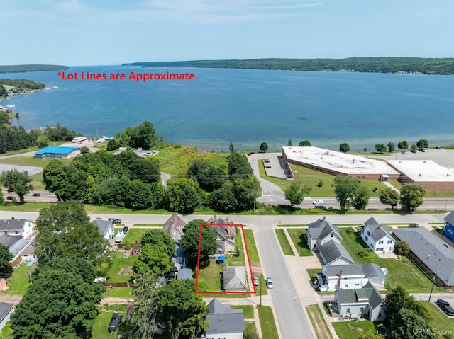 aerial view featuring a residential view and a water view