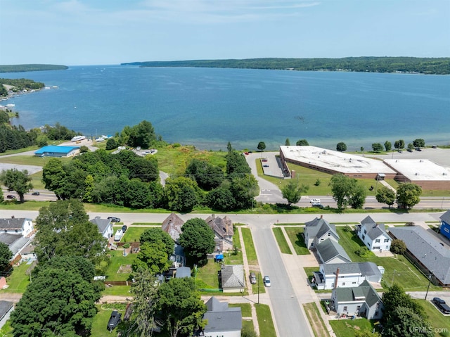 bird's eye view with a residential view and a water view
