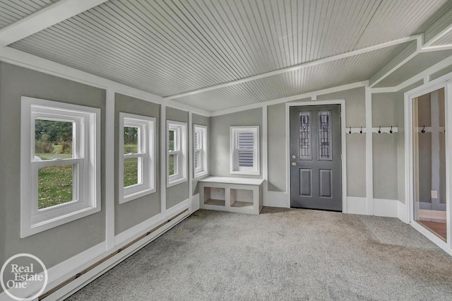unfurnished sunroom with a baseboard heating unit