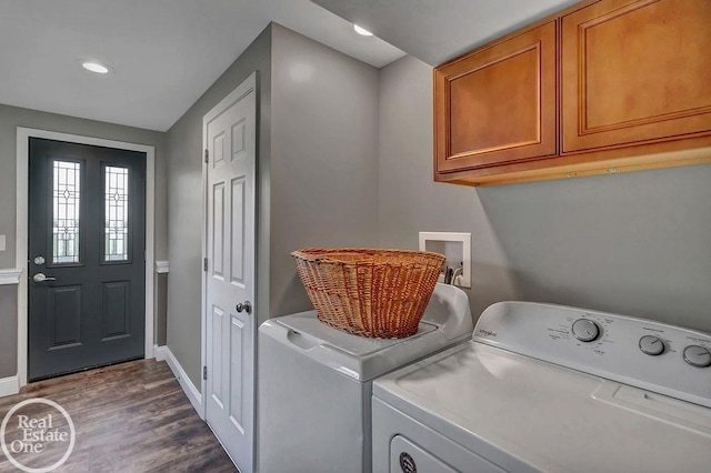 clothes washing area with dark wood-style flooring, baseboards, recessed lighting, separate washer and dryer, and cabinet space