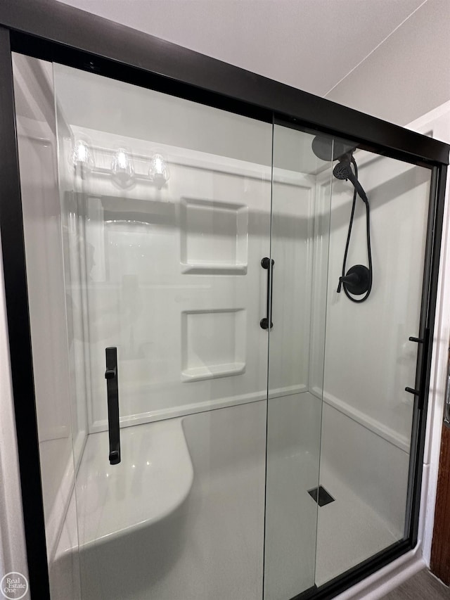 bathroom featuring a stall shower