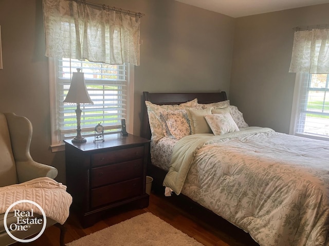 bedroom with wood finished floors