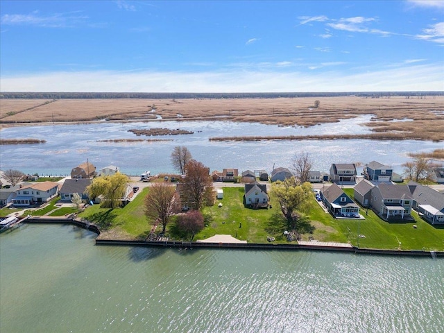 aerial view with a residential view and a water view