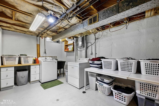 laundry room featuring laundry area, independent washer and dryer, and visible vents