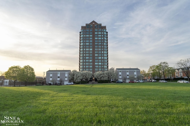 surrounding community with a lawn