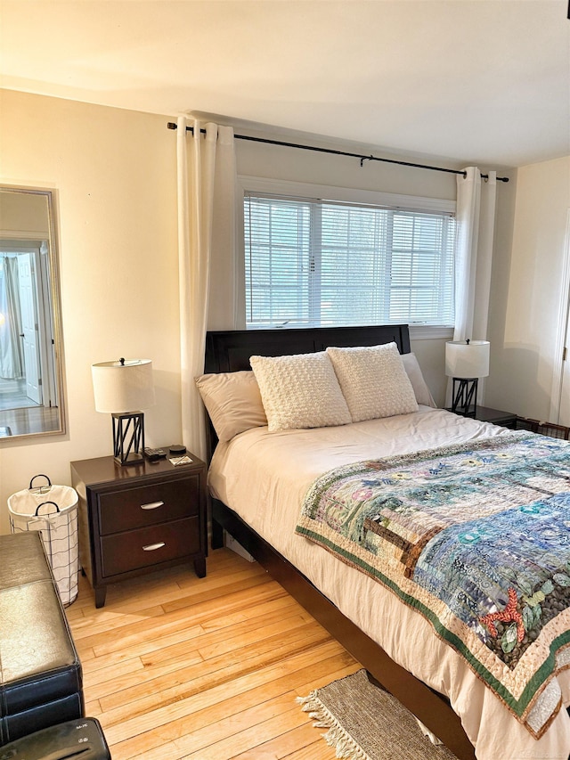 bedroom with light wood-style flooring