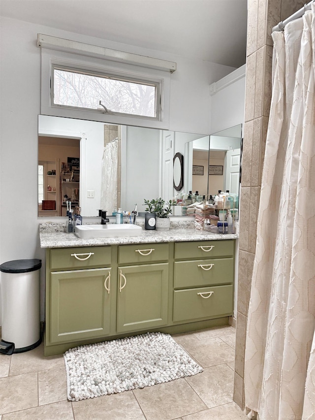 full bathroom with vanity and a shower with shower curtain