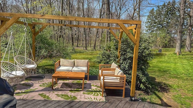 wooden terrace featuring a yard and an outdoor hangout area