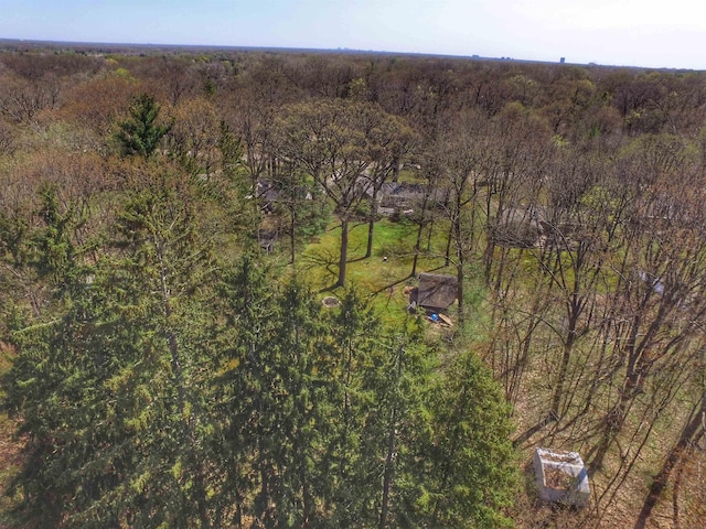 aerial view with a wooded view