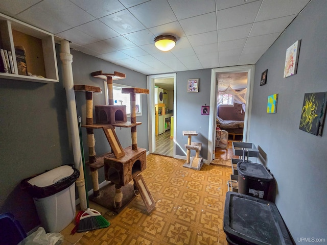 misc room with light floors and a wealth of natural light