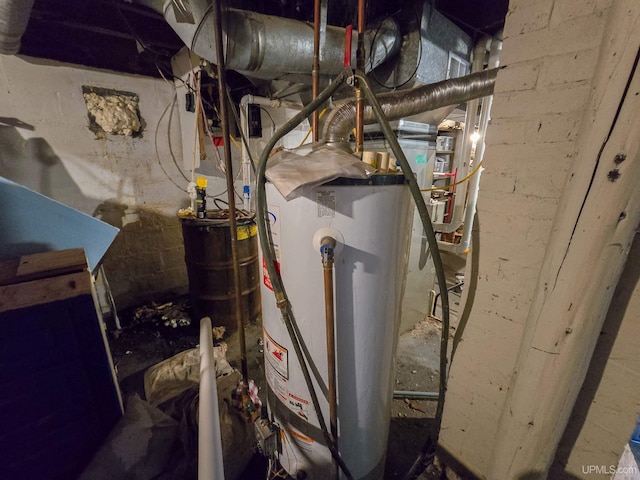 utility room with gas water heater