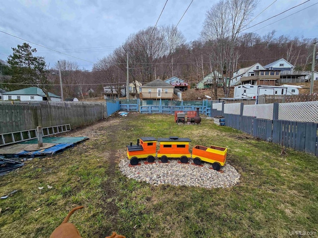 view of yard featuring a fenced backyard