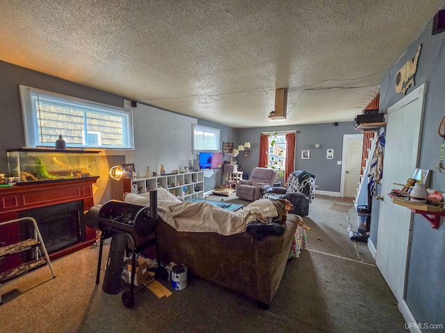 living room with carpet and a textured ceiling