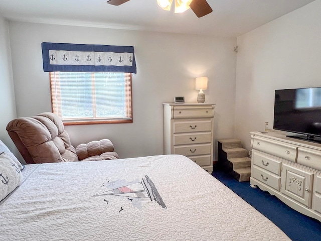 5421 Andrew St, Harrison, MI 48625 - bedroom with dark carpet and a ceiling fan