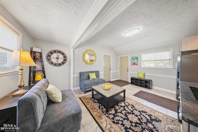 tiled living room featuring vaulted ceiling and a textured ceiling