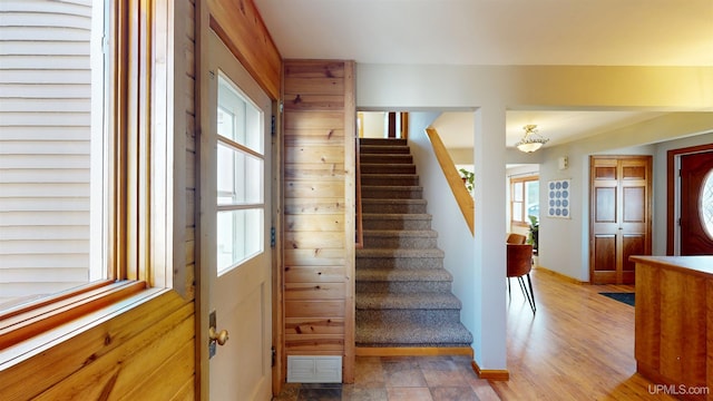 stairway featuring visible vents