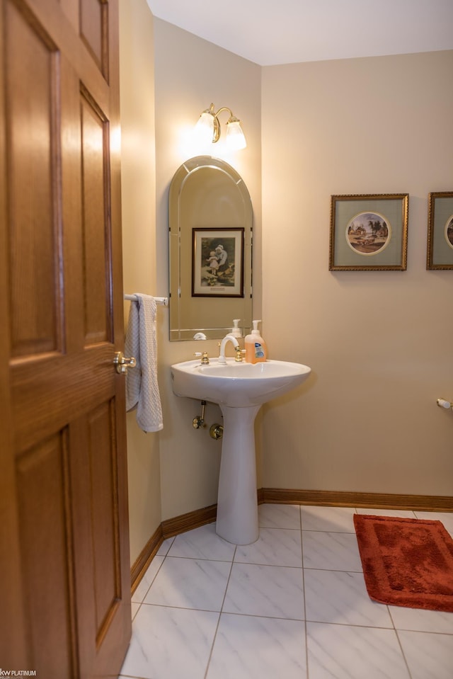 bathroom with baseboards