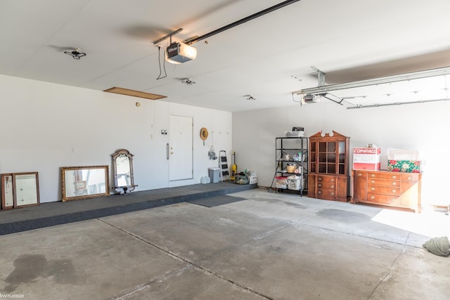 garage featuring a garage door opener