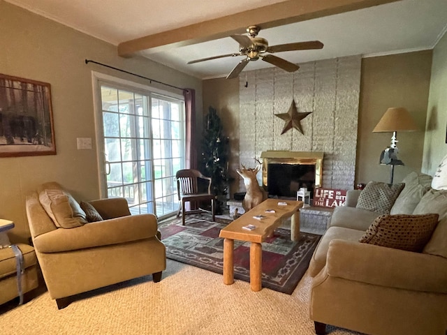 living room with carpet floors, ceiling fan, a fireplace, and beamed ceiling