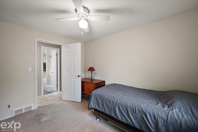bedroom featuring visible vents, carpet flooring, baseboards, and ceiling fan