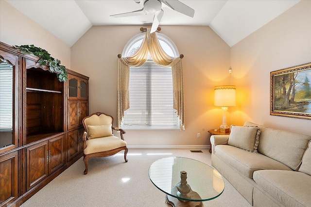 15113 Totten Pl, Shelby Twp, MI 48315 - living room featuring ceiling fan, visible vents, vaulted ceiling, carpet floors, and baseboards