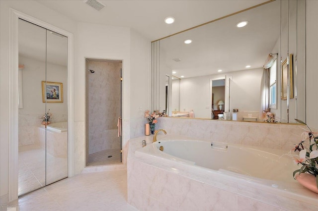 15113 Totten Pl, Shelby Twp, MI 48315 - full bath featuring visible vents, a bath, a stall shower, and recessed lighting