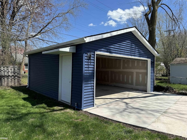 detached garage with fence